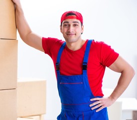 Contractor worker moving boxes during office move