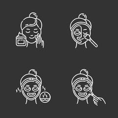 Skin care procedures chalk icons set. Applying exfoliating cream. Using thermal mask to open up pores. Liquid mask for facial treatment. Female beauty routine. Isolated vector chalkboard illustrations