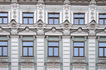  beautiful facade of an old building with stucco molding