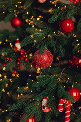 Christmas background with powdered sugar as Christmas tree, ginger cookies, anise and Christmas decorations on dark background. Creative cristmas concept. Top view, copy space, text place