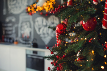 Christmas background with powdered sugar as Christmas tree, ginger cookies, anise and Christmas decorations on dark background. Creative cristmas concept. Top view, copy space, text place