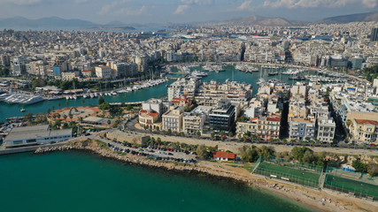 Aerial drone panoramic photo of iconic and busy port of Piraeus one of the largest in Mediterranean sea