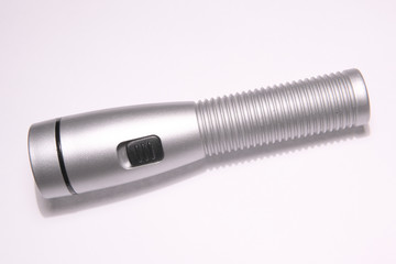 electric flashlight on a white background