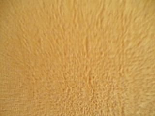 Vibrant (vague) textural background color of beige