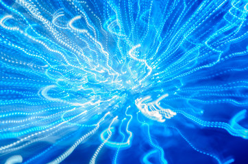 Abstract pattern of sparkling lightning on a blue background