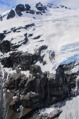 Rock under snow on top of the glacier in Queenstown