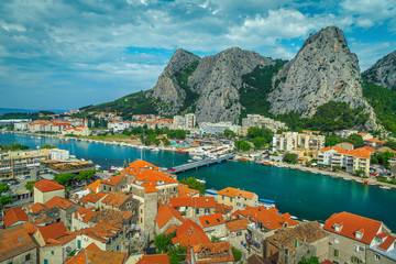 Naklejka na ściany i meble Aerial Omis cityscape with gorge and Cetina river, Dalmatia, Croatia