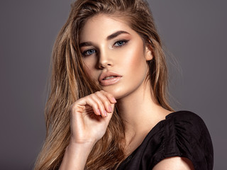 Woman with beauty long brown hair. Fashion model. Pretty Face.