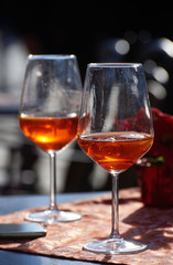 Two glasses with orange cocktail