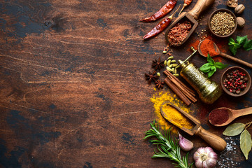 Assortment of spices and herbs. Top view with copy space.
