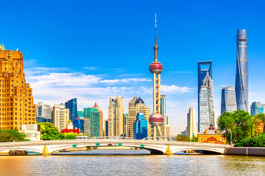 Shanghai Pudong Skyline With Historical Waibaidu Bridge, China During Summer Sunny Day