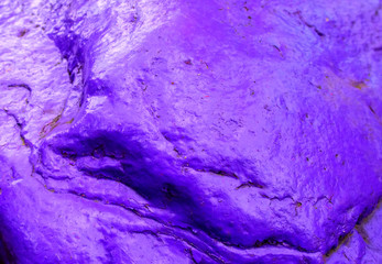OlOld painted granite stone rock background. Purple, Violetd painted granite stone rock background. 