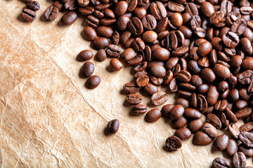 coffee beans on parchment paper background