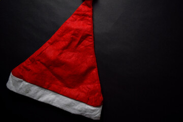 Santa Claus red hat isolated on black background