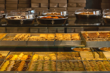 Assortment of greek patisserie on vitrine