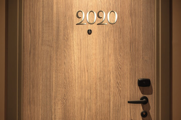 Happy New Year 2020 concept, lettering on the Hotel door