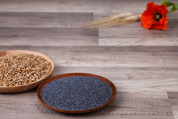 poppy seed on wooden background