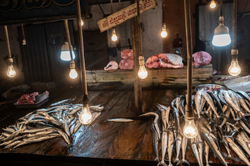 Fototapeta na wymiar Street fish market. On the table lies selling ocean fish.