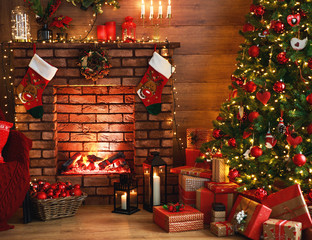 interior christmas. magic glowing tree, fireplace, gifts in  dark  .