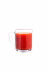 glass of tomato juice on a white background