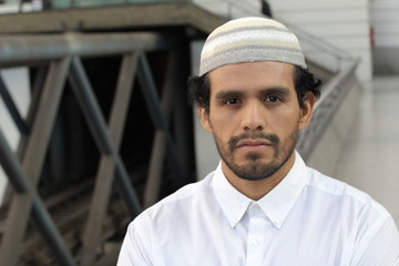 Islamic man with neutral expression 