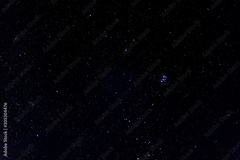Wall mural starry night sky. stars in the dark night sky.