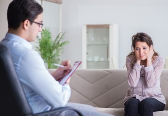 Pregnant woman visiting psychologist doctor