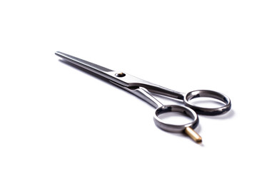 Barbers scissors on white background. Professional hairdressers accessory. Space for text.