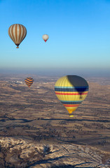  air balloons flight over landscape of Cappadocia, Turkey