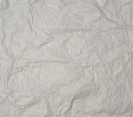 empty gray crumpled sheet of paper, full frame