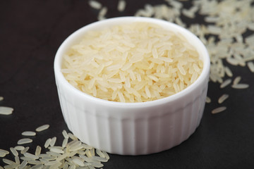 A glass bowl with white long-grain rice