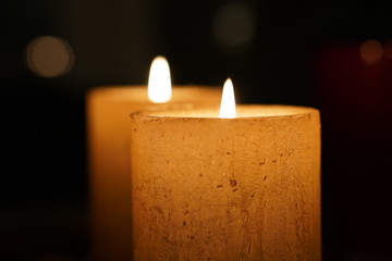 2 candles with flame in the dark, Close-up