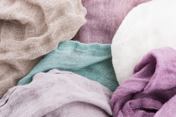 Multicolored textile with violet tones and colorful accents and rich, detailed texture, flax