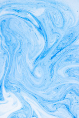 Fluid Art with white blue color. Abstract multicolored background. Blue white texture. Colored...