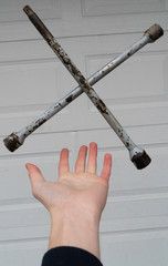 Wrench floating over hand