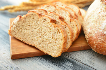 Sliced fresh bread on table