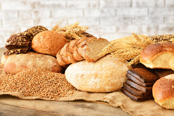 Assortment of fresh bakery products on wooden table