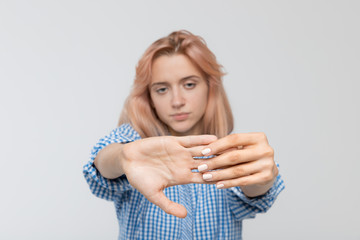 Girl suffering from pain and weakness in fingers. Massage and kneading of hands. Osteoarthritis,...