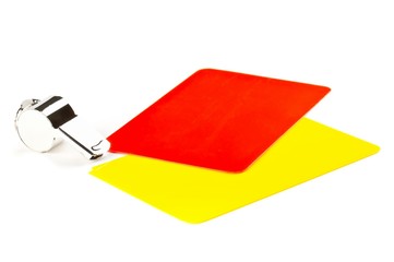 Soccer sports referee yellow and red cards with chrome whistle on white background