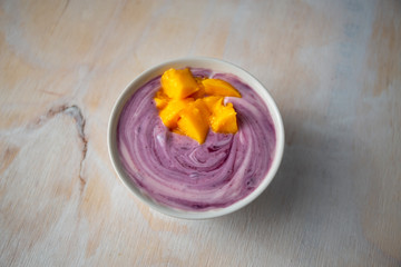 Fototapeta na wymiar Almond Yoghurt with nuts and blueberry