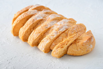Sliced fresh bread on white background