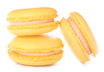 Tasty macarons on white background