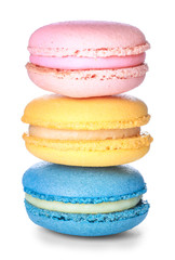Different tasty macarons on white background