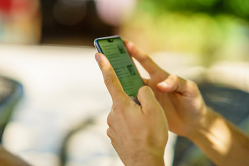 Man using smartphone. Surfing in the net