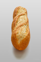 French mini baguette with crispy crust on white background