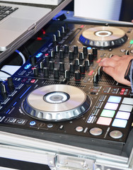 dj mixing board at a party