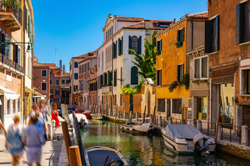 Fototapeta na wymiar Bright colorful houses on Venetian lagoon, Venice