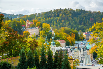 Cityscape of Karlovy Vary with thermal spring colonnade and church