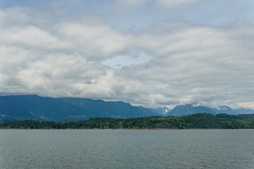 ocean and mountains view from ferry Howe Sound near Gibsons Canada.