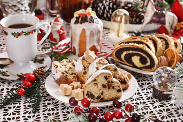 Obraz na płótnie Canvas traditional cakes for Christmas on festive table